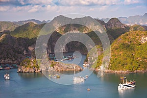 Sea landscape in Vietnam with many small islands and boats. View from above