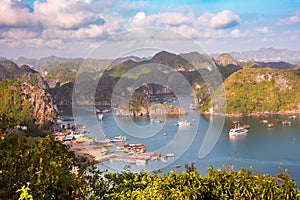 Sea landscape in Vietnam with many small islands and boats. View from above