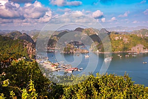 Sea landscape in Vietnam with many small islands and boats. View from above