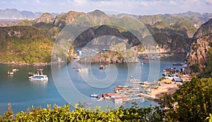 Sea landscape in Vietnam with many small islands and boats. View from above