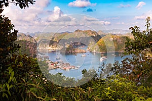 Sea landscape in Vietnam with many small islands and boats. View from above