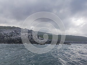 Sea Landscape Waves Crashing against the Rocky Shoreline, Cloudy Sky