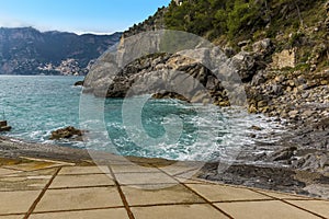 The sea laps the shore at Gavitella Beach in Praiano. Italy on the Amalfi coast