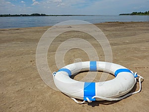 Sea life saver float on the river surface