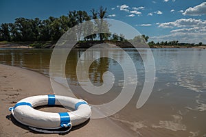 Sea life saver float on the river surface