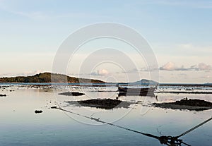 Sea with morning light and fishing boat