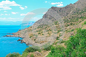 Sea and Mountains landscape at Cape Meganom, the east coast of the peninsula of Crimea. Beautiful nature, Colorful background.