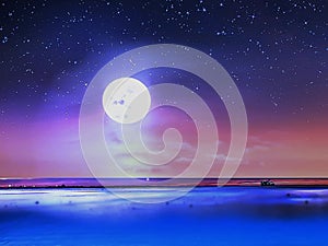 Sea at night .starry sky. full moon .pink sunset on blue wave reflection .ocean skyline at horizon .nature  background