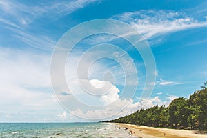 Sea or ocean calm water with blue sky and white clouds.