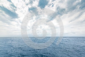Sea ocean concept. View of deep blue sea and overcast sky. Endless sea view and horizon. Ocean, world