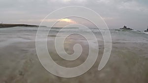 Sea ocean waves hitting the seashore camera water drop on the lens movement