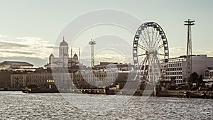 A sea panorama of Helsinki with the Cathedral and SkyWheel, Finland in summer