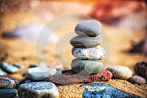 Sea pebble stones tower on beach