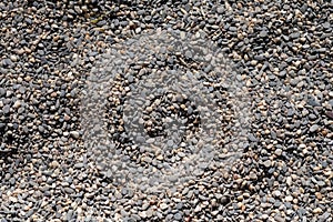 Sea pebble texture. Small rocks. Small multicolored pebble-stones. Beach stones surface