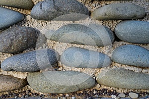 sea pebbles with concrete as background 2