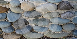 sea pebbles with concrete as background 3