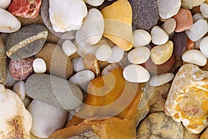Sea pebbles of different colors and shape