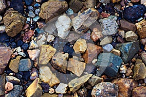 Sea pebbles and small stone gravel