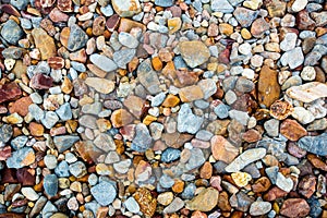 Sea pebbles. Small stones gravel texture background.Pile of pebbles, thailand.Color stone in background.