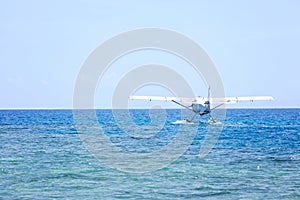 Sea plane on water photo
