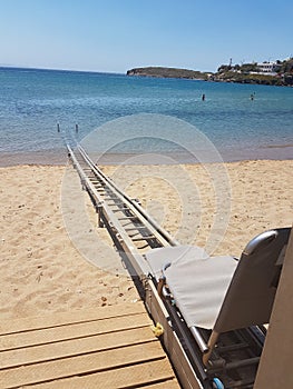 Sea ramp for disabled person to have access to the sea in batsi city andros island greece