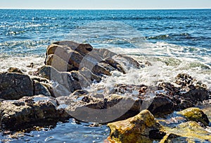 Sea rock stone formation wave spray