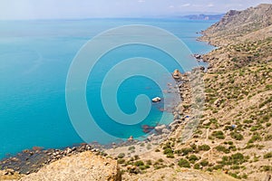 Sea and rocks landscape at Cape Meganom, the east coast of the peninsula of Crimea. Colorful background, travelling concept.
