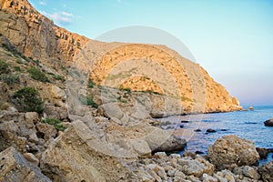 Sea and rocks landscape at Cape Meganom, the east coast of the peninsula of Crimea. Colorful background. Travelling concept. Copy