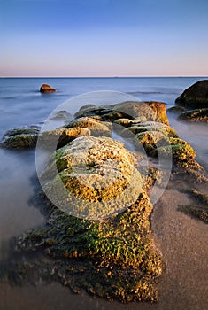 Sea rocks at the sunset