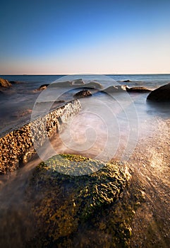 Sea rocks at the sunset