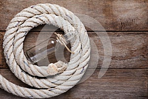 Sea rope with shell and message bottle