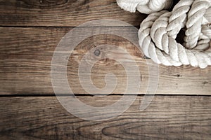 Sea rope on a wooden floor, close-up