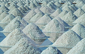 Sea salt farm in Thailand. Organic sea salt. Evaporation and crystallization of sea water. Raw material of salt industrial.