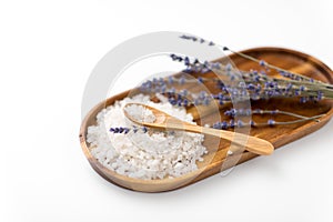 Sea salt heap, lavender and spoon on wooden tray