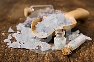 Sea salt with lavender in wooden scoop