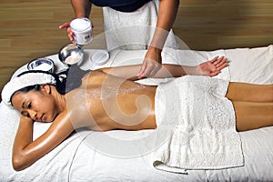 Sea Salt Scrub Massage Treatment in a spa setting.