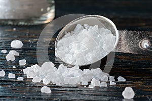 Sea Salt Crystals Spilled fromm a Teaspoon