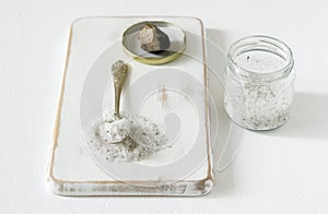 Sea salt with truffle and truffle on a light background. Rustic style.