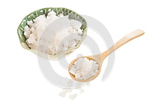 Sea salt on wooden spoon and bowl