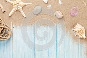 Sea sand with starfish and shells