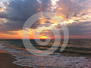 Sea, seagulls and sunrise