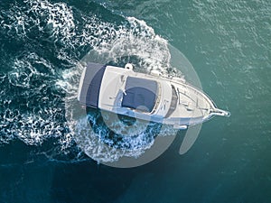 Sea service team in fast speed motor boat top overhead view v