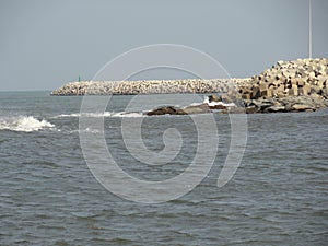 sea shore with cement blocks for protection from tsunami waves clicked in colombo sri lanka