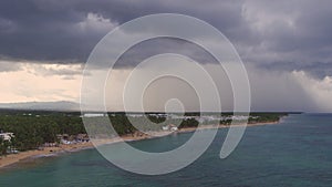 Sea shore in cloudy weather above