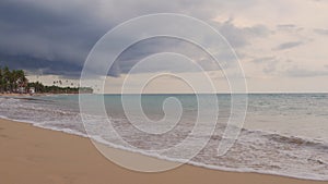 Sea shore in cloudy weather above