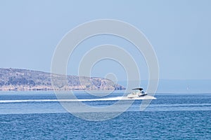 At the sea side - speeding boat