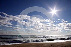 Sea, sky, clouds, sun and waves