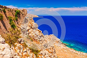 Sea skyview landscape photo from Feraklos castle near Agia Agathi beach on Rhodes island, Dodecanese, Greece. Panorama with sand