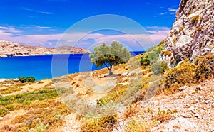 Sea skyview landscape photo near Agia Agathi beach and Feraklos castle on Rhodes island, Dodecanese, Greece. Panorama with sand