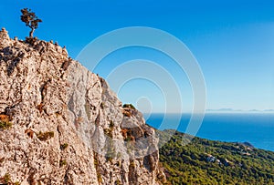 Sea skyview landscape photo from ruins of Monolithos castle on Rhodes island, Dodecanese, Greece. Panorama with green mountains